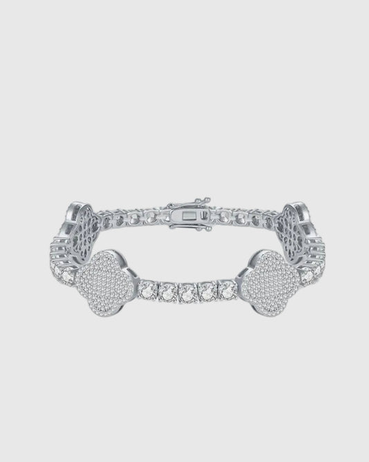 Full studio view of the Aerion Trèfle rhodium-plated sterling silver tennis bracelet, highlighting the seamless integration of 4mm round-cut moissanites and micromosaic pavé clovers.