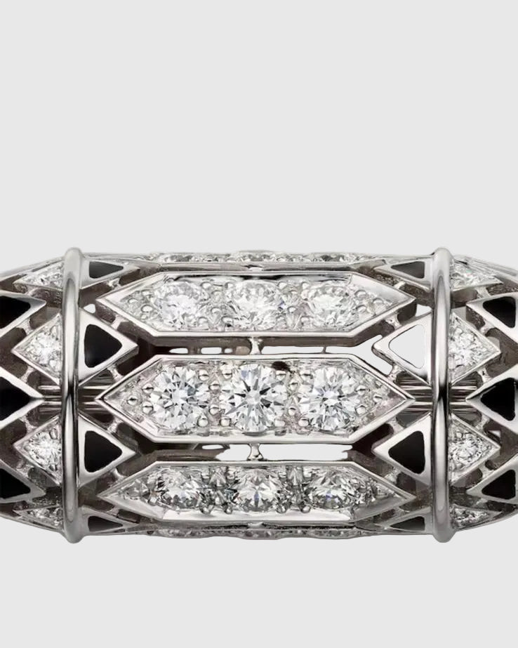 Macro detail of the hand-finished solid silver ring showing the flawless brilliant-cut zircon stones contrasted against deep black lacquer.