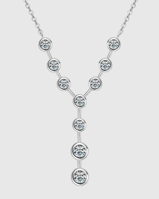 Front view of the rhodium-plated 925 sterling silver lariat necklace featuring brilliant D-color VVS1 moissanite stones in a vertical Y-shaped cascade.
