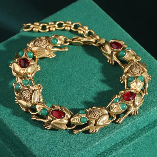 Thaloura — 18K Gold Mythic Jade