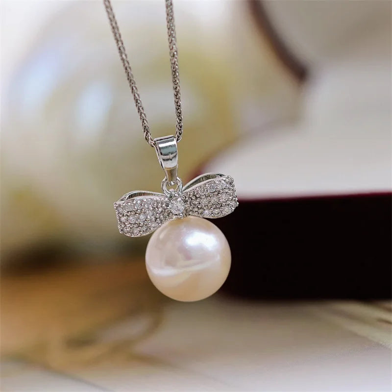 Veloura | Bow-Tied Pearl Pendant
