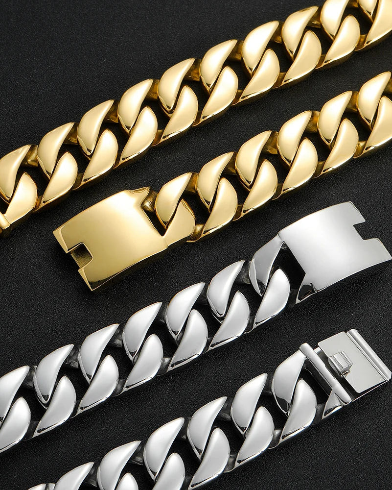 Gold and silver chain bracelets on a black background