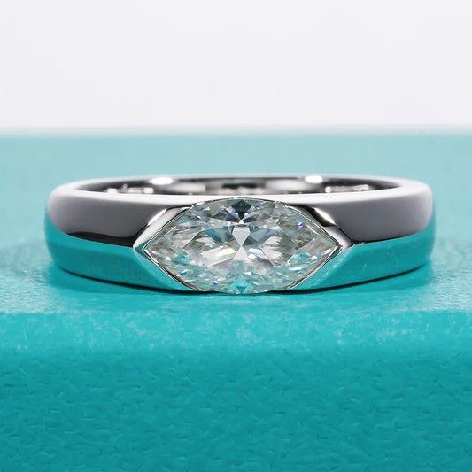 A marquise-cut moissanite ring with a 1ct D-color VVS1 clarity, set in sterling silver and plated in 18K white gold.