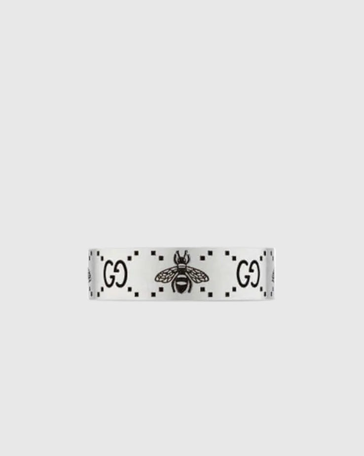 GUCCI ring with bee design on a white background