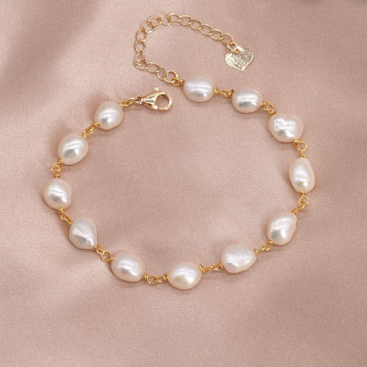 Auréline — Pearls in Golden Motion