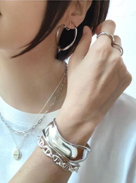 Twistlight — Sculpted Silver Flow