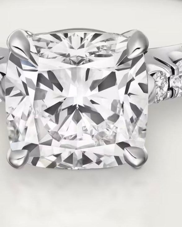 Aerion Lumière 4-carat Radiant Cut Moissanite Solitaire Ring with 4-claw prong setting and U-Cut Pavé band, showcasing D-color VVS1 brilliance on a white background.