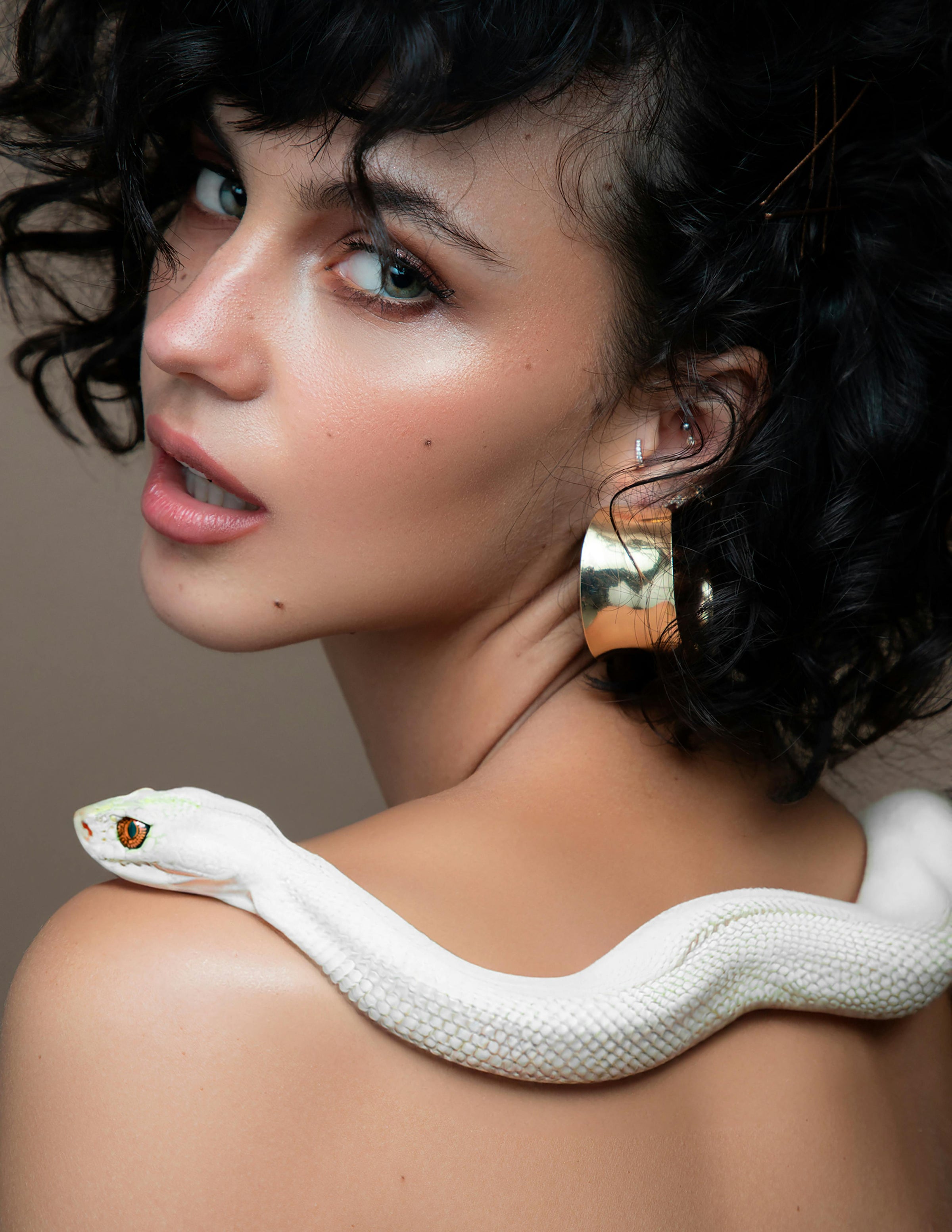 She Wears Danger Like Jewelry