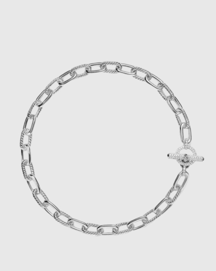 Top-down studio layout of the 18-inch solid Italian silver chunky chain necklace, highlighting the 11mm pillow-shaped alternating smooth and cabled links.