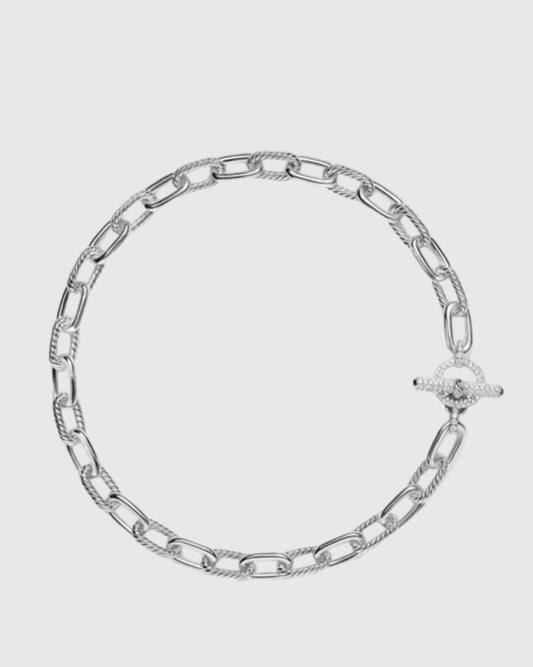 Top-down studio layout of the 18-inch solid Italian silver chunky chain necklace, highlighting the 11mm pillow-shaped alternating smooth and cabled links.