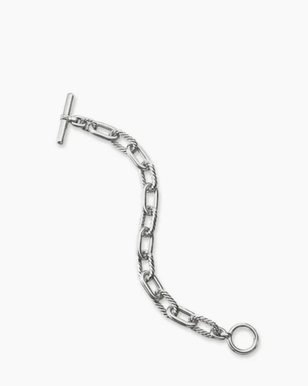 Top-down studio layout of the 18-inch solid Italian silver chunky chain bracelet, highlighting the 11mm pillow-shaped alternating smooth and cabled links.