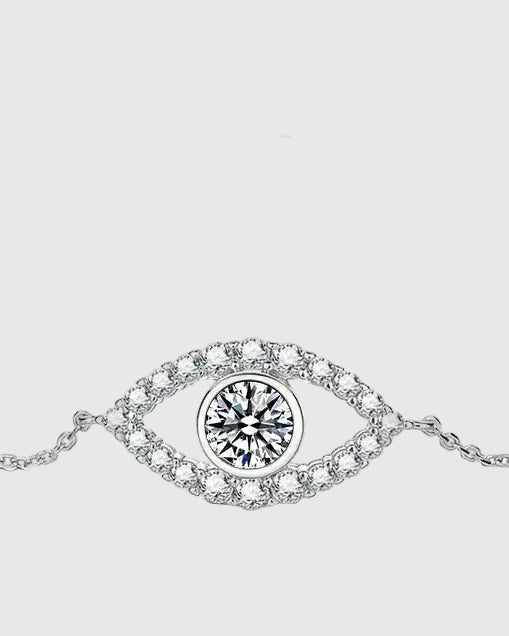Full studio view of the Aerion Oculus 925 sterling silver bracelet, highlighting the brilliant 1-carat white moissanite center stone framed by a zircon pave halo in an evil eye motif.