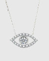 Full studio view of the Auréveil Oculus 925 sterling silver necklace, highlighting the brilliant 1-carat white moissanite center stone framed by a zircon pave halo in an evil eye motif.