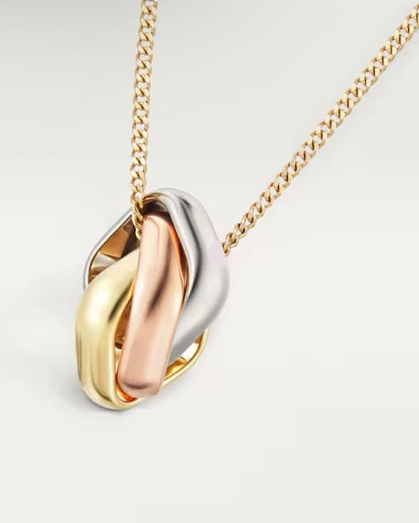 Full layout view of the Harmonie Trio necklace, highlighting the elongated 24-inch premium 18K yellow gold PVD plated chain and the secure lobster clasp mechanism.