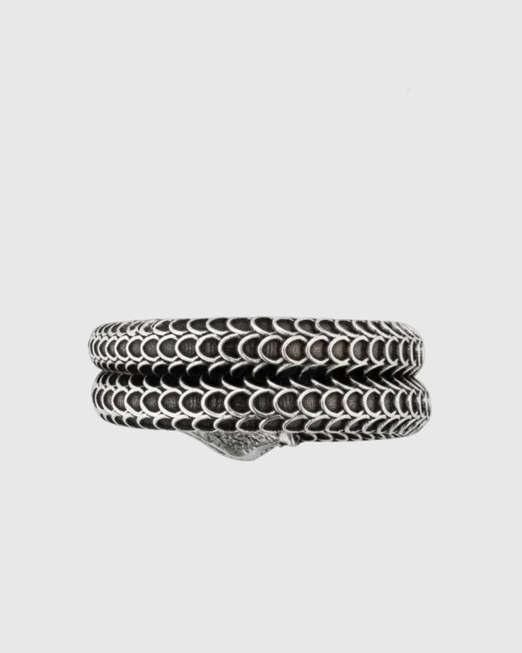 Close-up of the sculpted solid silver snake rear and the coiled double-band silhouette, highlighting the antique Italian craftsmanship.