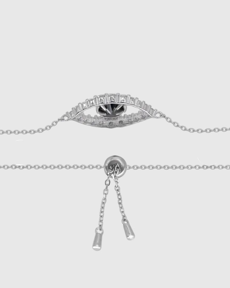 Detailed back view of the Aerion Oculus bracelet showing the premium adjustable sliding bolo clasp with dangling silver chain drops, designed for a customized and comfortable fit.