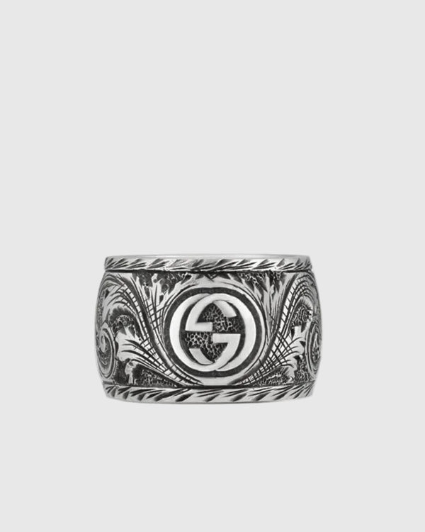 Back view of the engraved 925 silver band revealing the iconic interlocking monogram on an oxidized background.