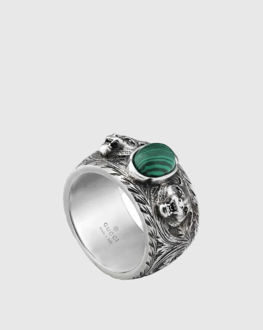 Angled view of Aerion Marmont 925 solid silver statement ring with malachite green stone and sculpted feline head.
