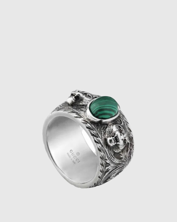 Angled view of Aerion Marmont 925 solid silver statement ring with malachite green stone and sculpted feline head.