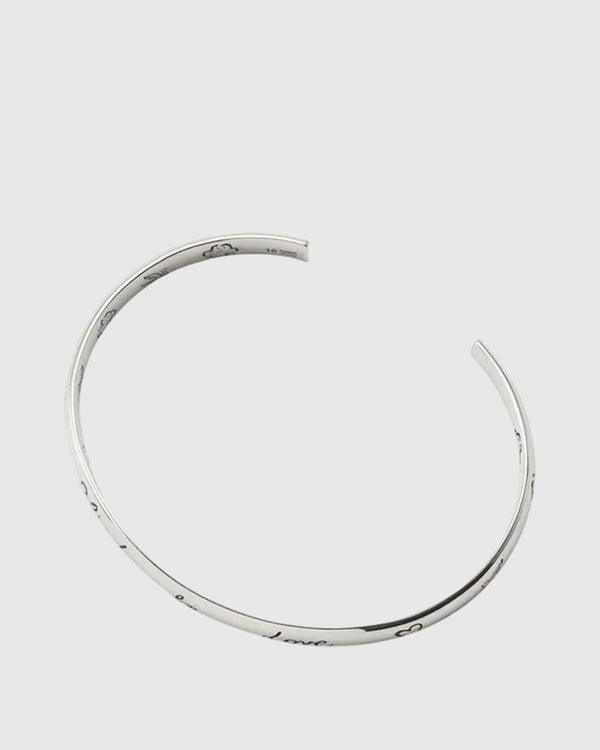 Silver bracelet on a white background.