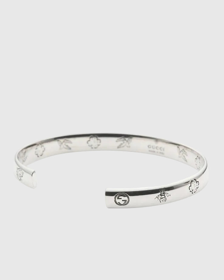Silver bracelet displayed on a white background.