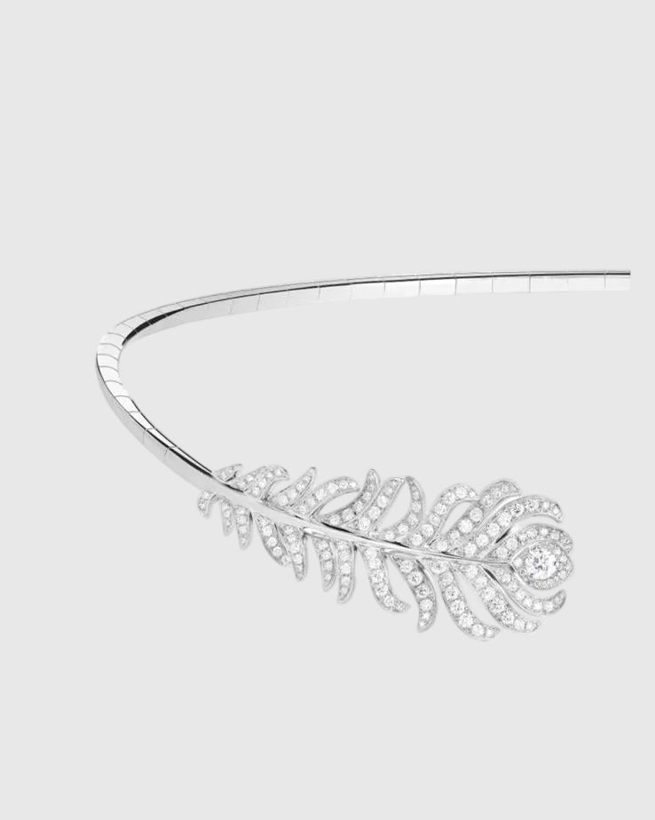 Front view of the peacock feather head of the L’Éthérée necklace, featuring 274 pavé-set VVS1 diamonds on white gold plated silver.