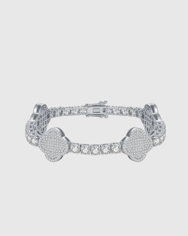 Full studio view of the Aerion Trèfle rhodium-plated sterling silver tennis bracelet, highlighting the seamless integration of 4mm round-cut moissanites and micromosaic pavé clovers.