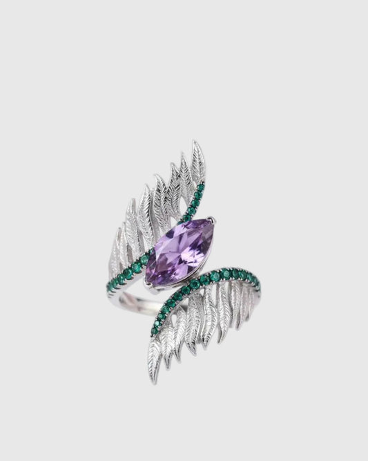  Front angled view of the Aetheria Art Deco statement ring showcasing a brilliant 2.55ct marquise-cut natural deep purple amethyst with contrasting green agate pavé feathers.