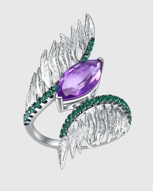  Front angled view of the Aetheria Art Deco statement ring showcasing a brilliant 2.55ct marquise-cut natural deep purple amethyst with contrasting green agate pavé feathers.