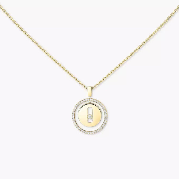 Gold necklace with a round pendant on a white background