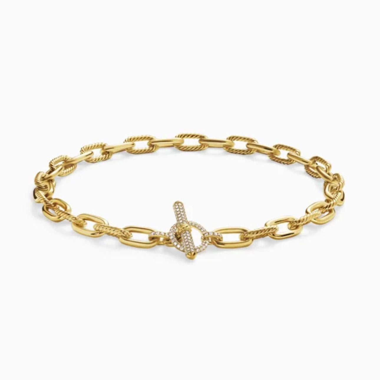 Gold chain bracelet with a Toggle clasp on a white background