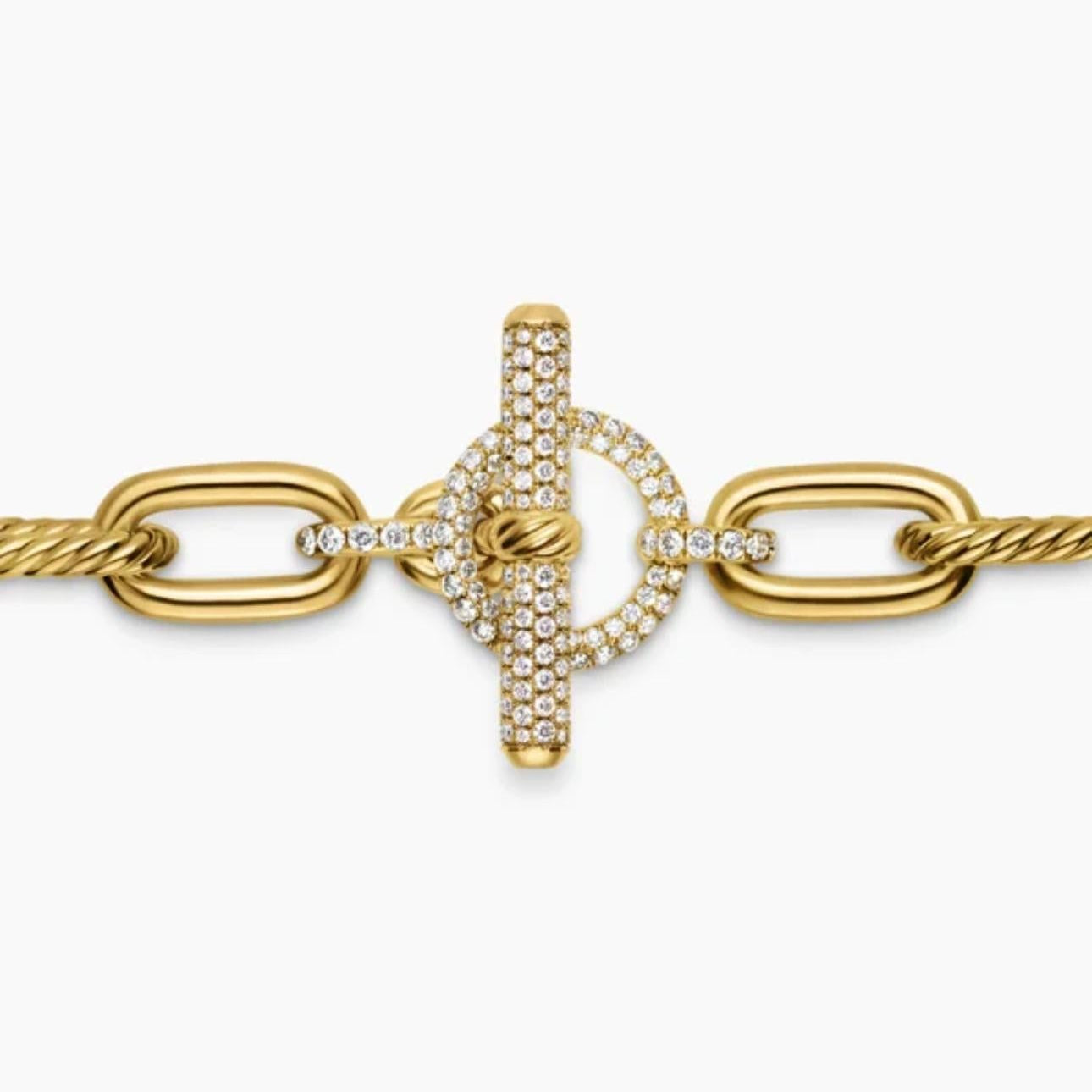 Close up Silver chain bracelet with a Pave Toggle clasp on a white background