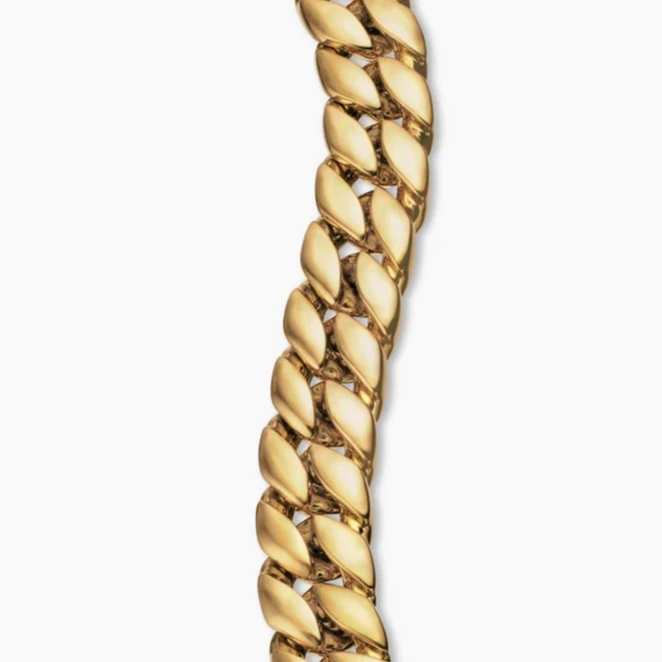 Gold Curb Chain Bracelet on a plain background
