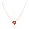 Ladybug pendant necklace on a white background