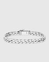 Full top-down studio view of the Aventino solid sterling silver curb link bracelet, highlighting the flowing S-curve chain links and integrated box clasp.