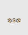 Front profile view of the 6g solid Italian silver and gold eternity ring, highlighting the flawless 1.14-carat moissanite stones elegantly bound by golden X accents.