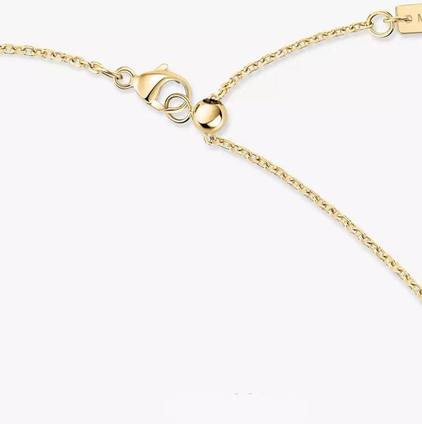 Gold bracelet with a clasp on a white background
