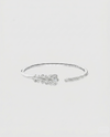 Front view of the peacock feather head of the L’Éthérée bracelet, featuring 117 pavé-set VVS1 diamonds on white gold plated silver.