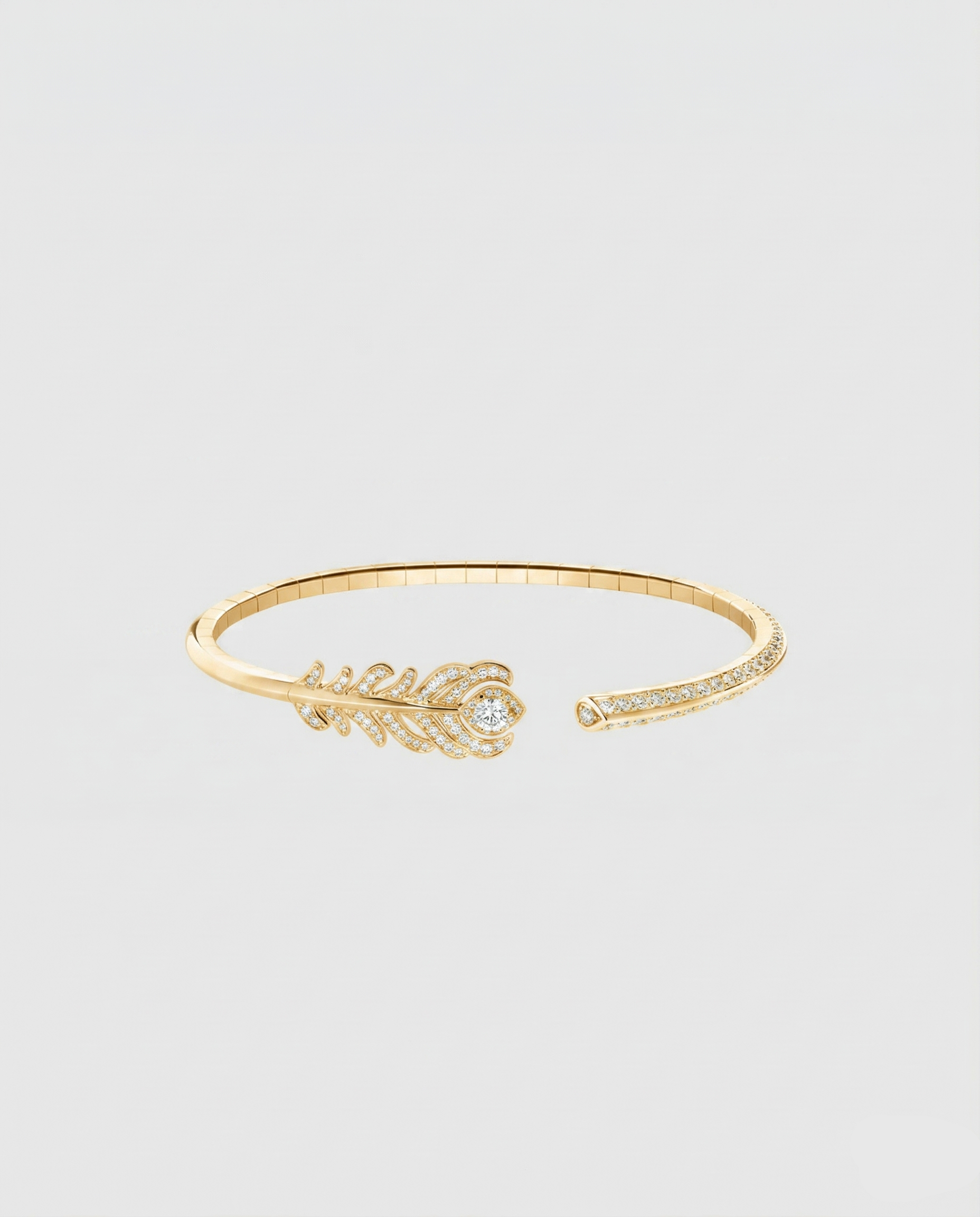 Front view of the peacock feather head of the L’Éthérée bracelet, featuring 117 pavé-set VVS1 diamonds on gold plated silver.