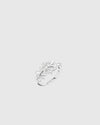 Top-down view of the L’Éthérée ring showing its open circular design that wraps the finger, featuring 84 pavé-set VVS1 diamonds on white gold plated silver.