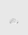 Top-down view of the L’Éthérée ring showing its open circular design that wraps the finger, featuring 84 pavé-set VVS1 diamonds on white gold plated silver.