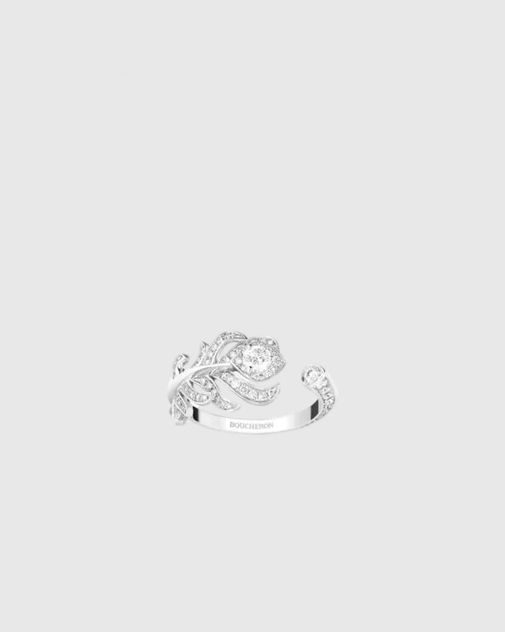 Top-down view of the L’Éthérée ring showing its open circular design that wraps the finger, featuring 84 pavé-set VVS1 diamonds on white gold plated silver.