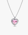 Angled view of the Rosavie heart necklace highlighting the fire and brilliance of the pink moissanite stone.