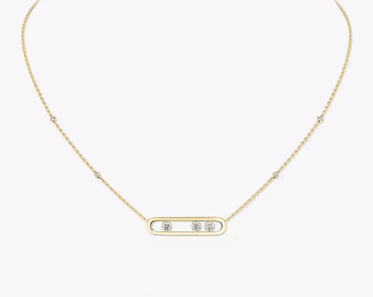 Gold necklace with small diamonds on a white background