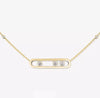Gold necklace with three diamonds on a white background
