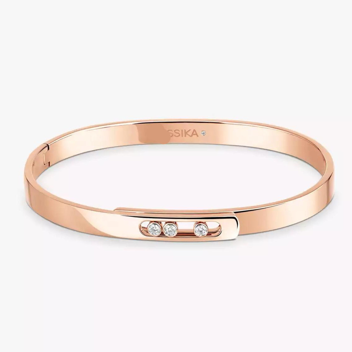 Rose gold diamond bangle bracelet with small diamonds on a white background.