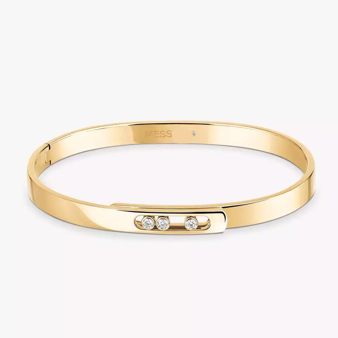 gold diamond bangle bracelet with small diamonds on a white background.