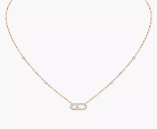 rose Gold necklace with a small pendant on a white background