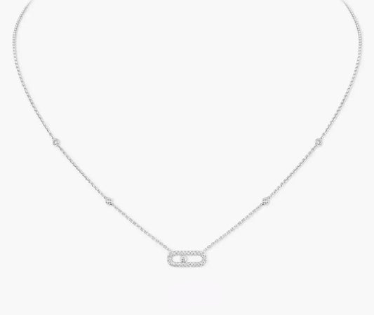 Silver necklace with a small pendant on a white background