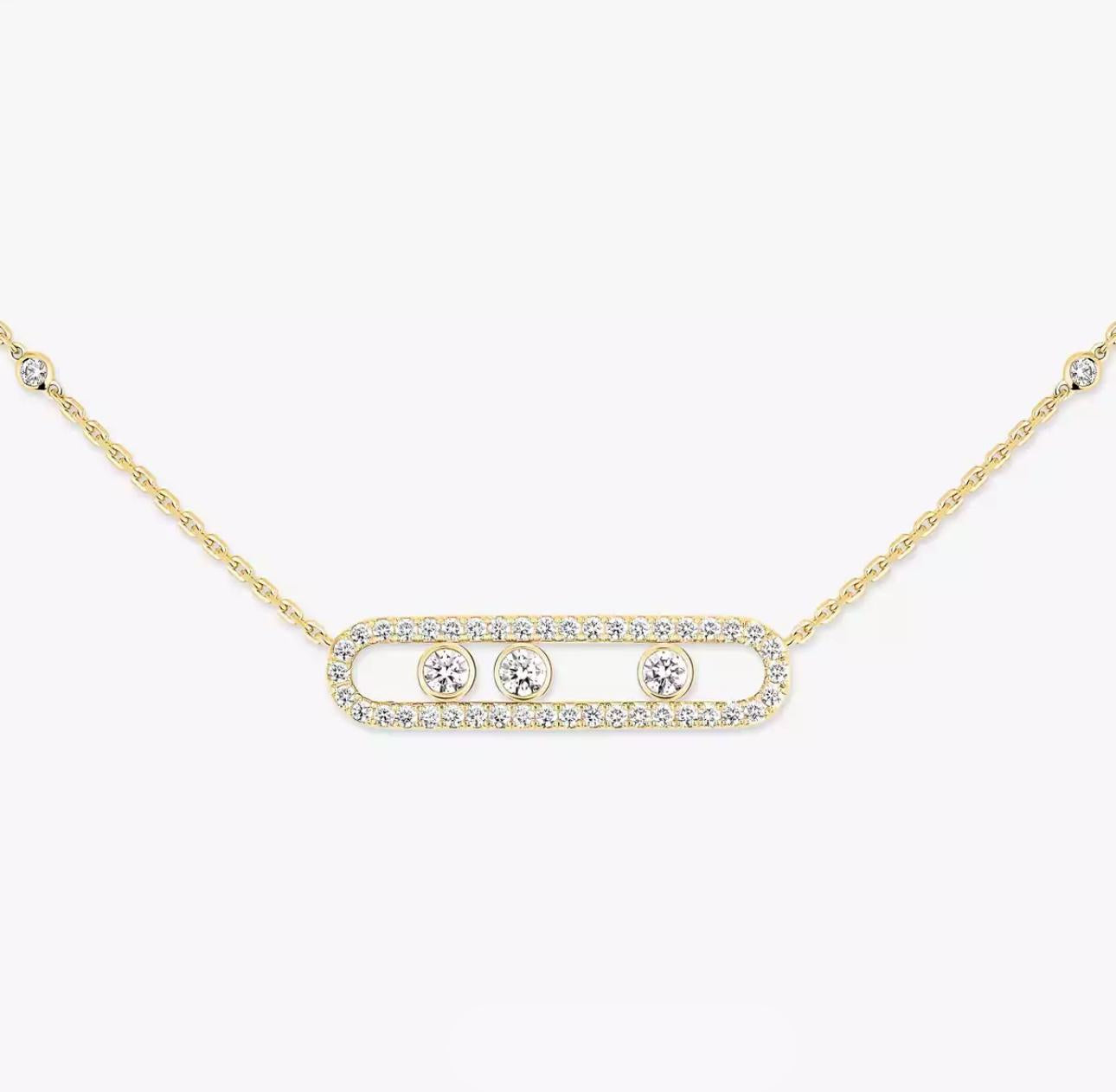 Gold necklace with three diamonds on a white background